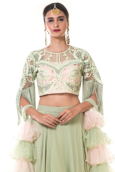 Green Layered Skirt with Heavy Hand Embroidered Blouse with Fringes and Ruffle Net Dupatta