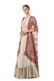 Hand Embroidered Blouse & Ruffle Lehenga Set with a Heavy Embroidered Tasselled Cape